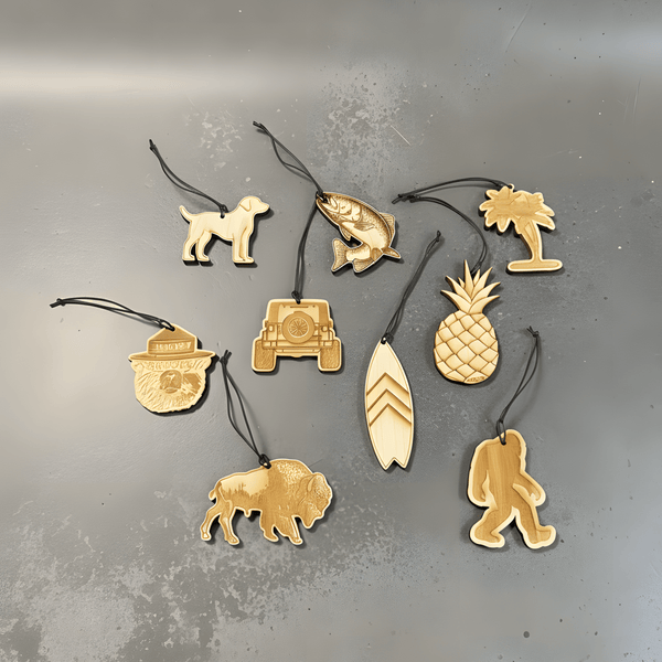 Collection of wooden car freshener on a gray surface